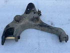 1999 Mitsubishi Montero Sport Left Driver Side Front Lower Control Arm Used. Price: $43.13.