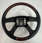 03-06 Cadillac Escalade Steering Wheel W/controls Rare Oem Black Woodgrain Used. Price: $229.99.