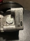 Power Steering Pump With Pulley Ford CT43-3A696-BA Used. Price: $71.25.